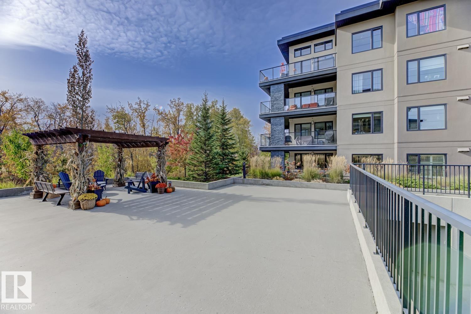 #210 5029 EDGEMONT BV NW