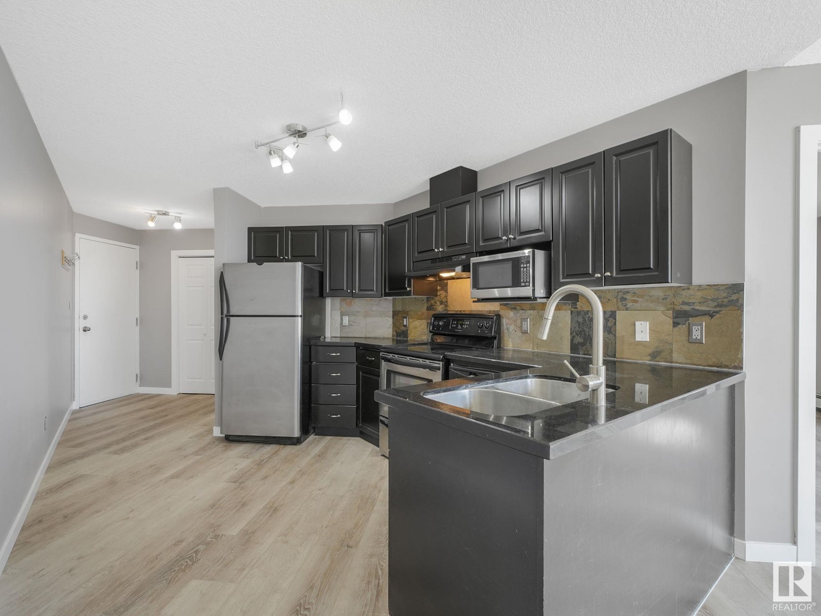 #303 9336 JASPER AV NW
