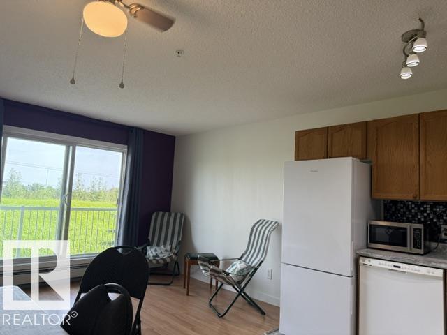 #210 70 WOODSMERE CL