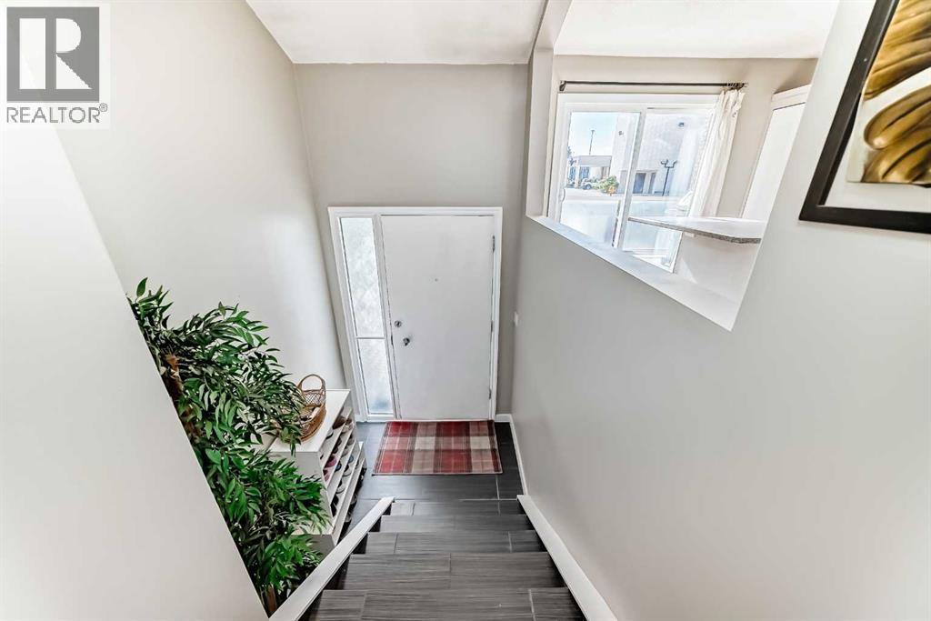 208, 1305 Glenmore Trail SW
