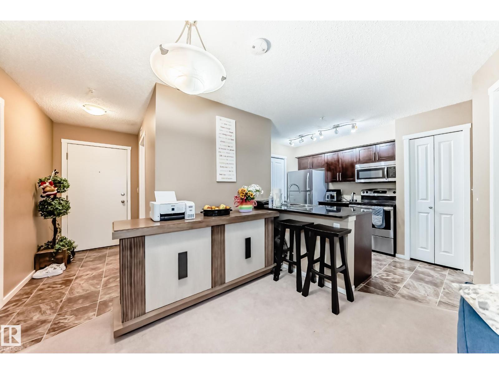 #116 5810 MULLEN PL NW