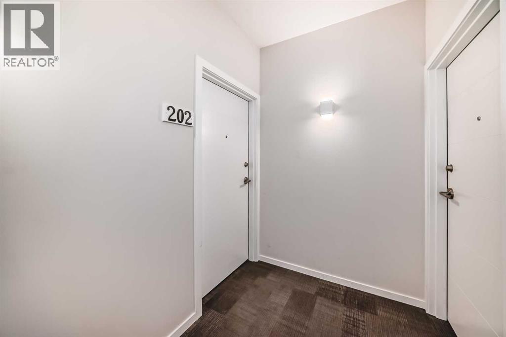 202, 245 Redstone Walk NE