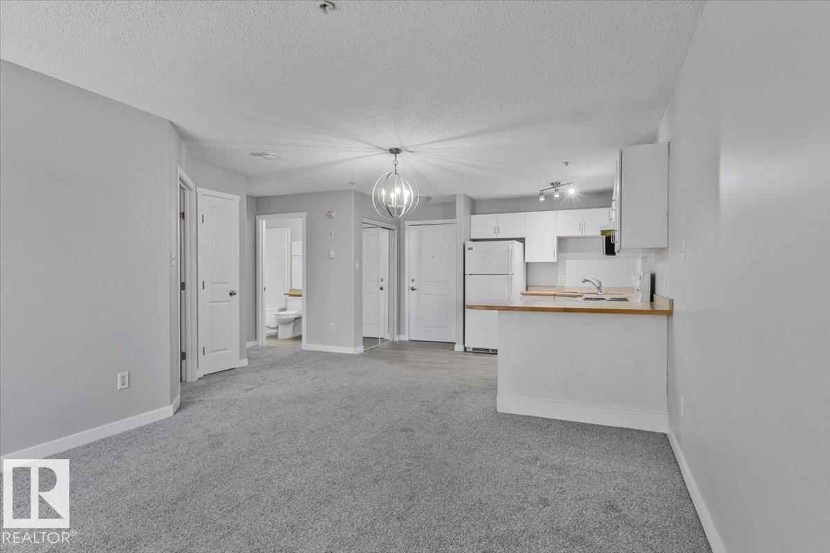 #130 11325 83 ST NW