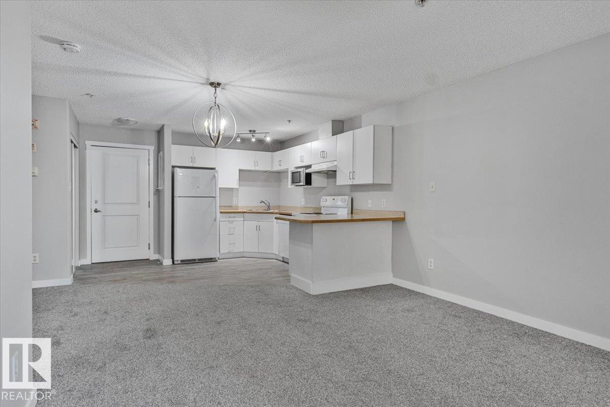 #130 11325 83 ST NW