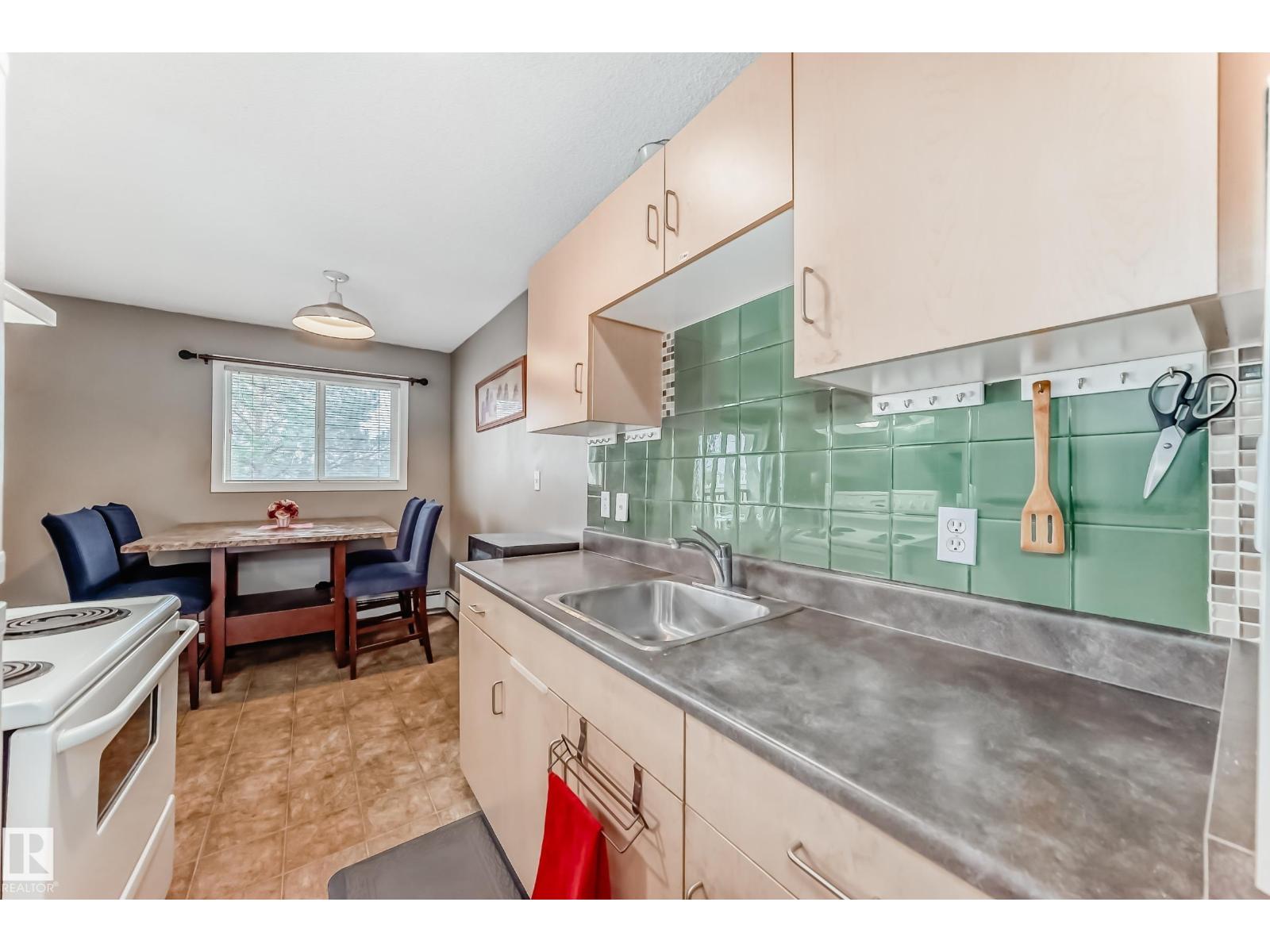 #305 12710 127 ST NW