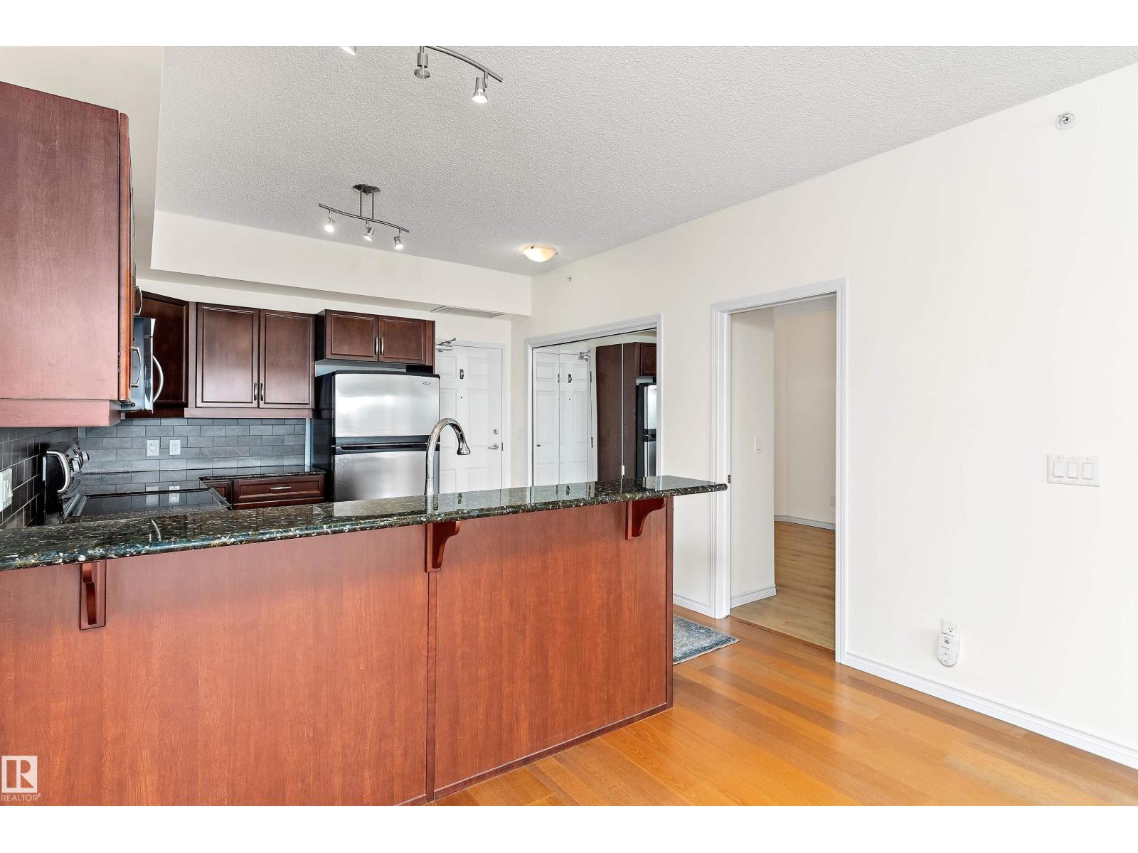 #702 10303 111 ST NW