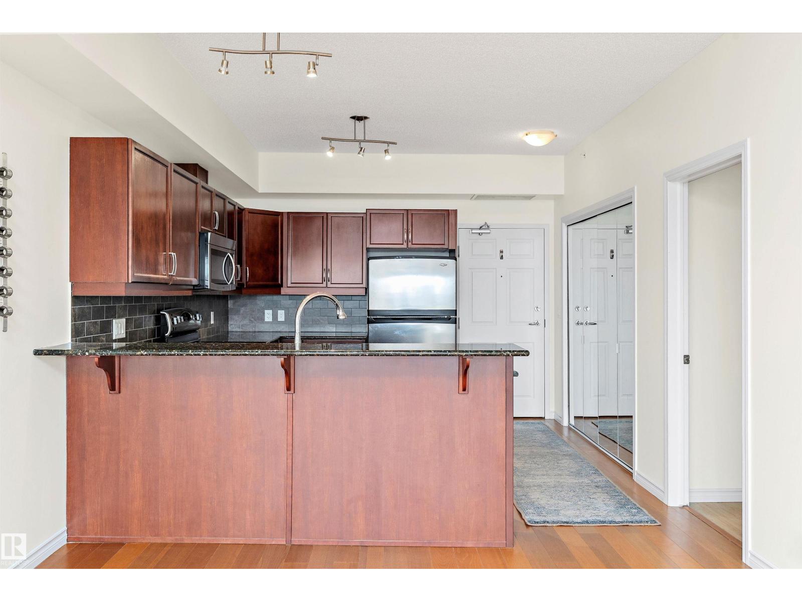 #702 10303 111 ST NW
