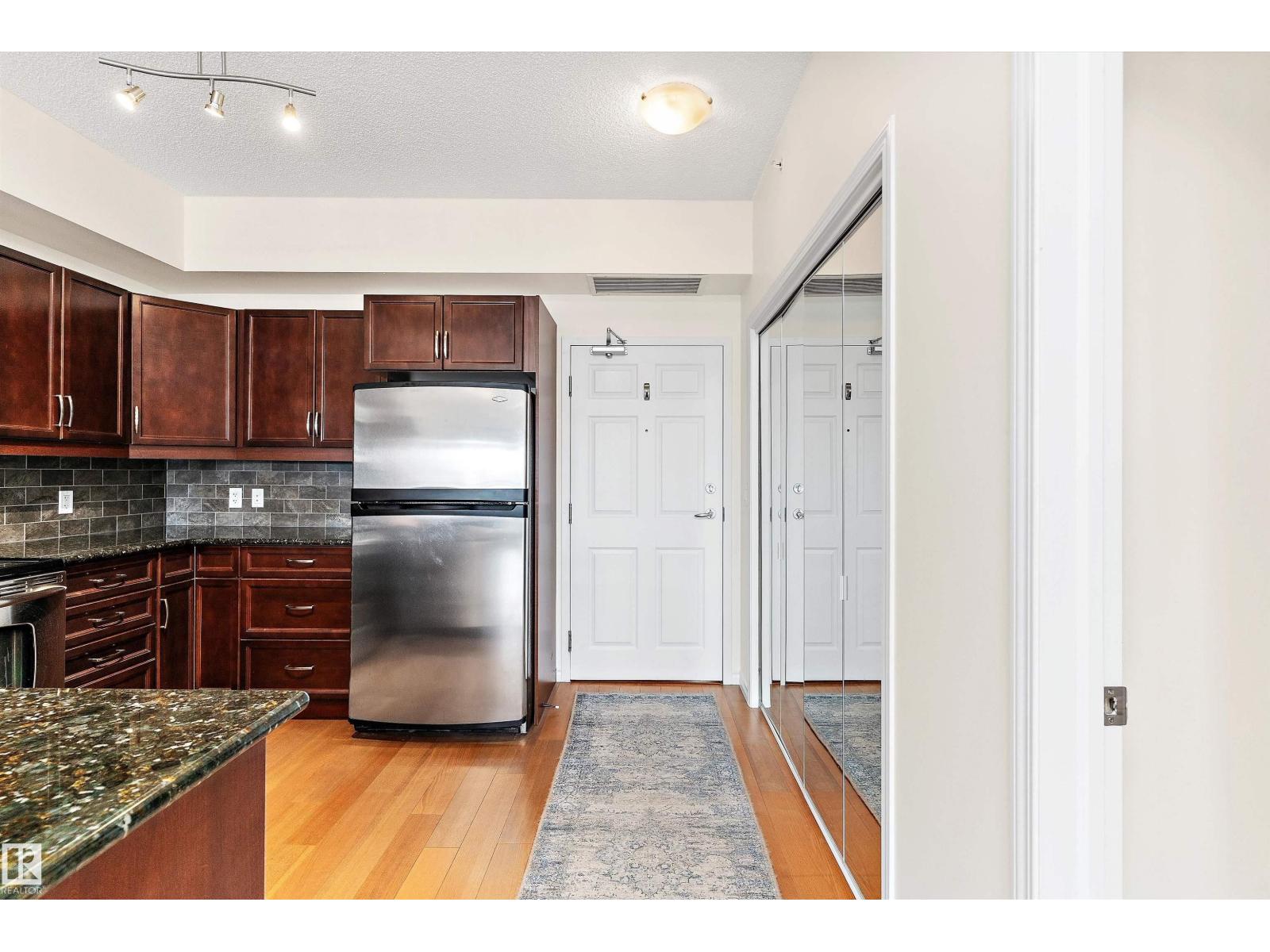#702 10303 111 ST NW