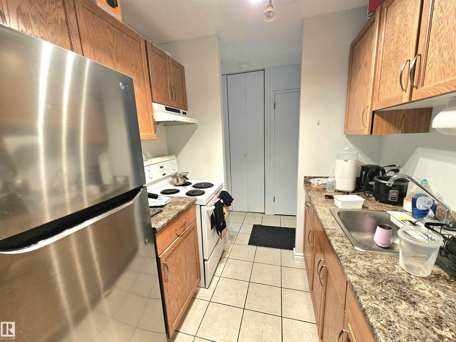 #718 13910 STONY PLAIN RD NW