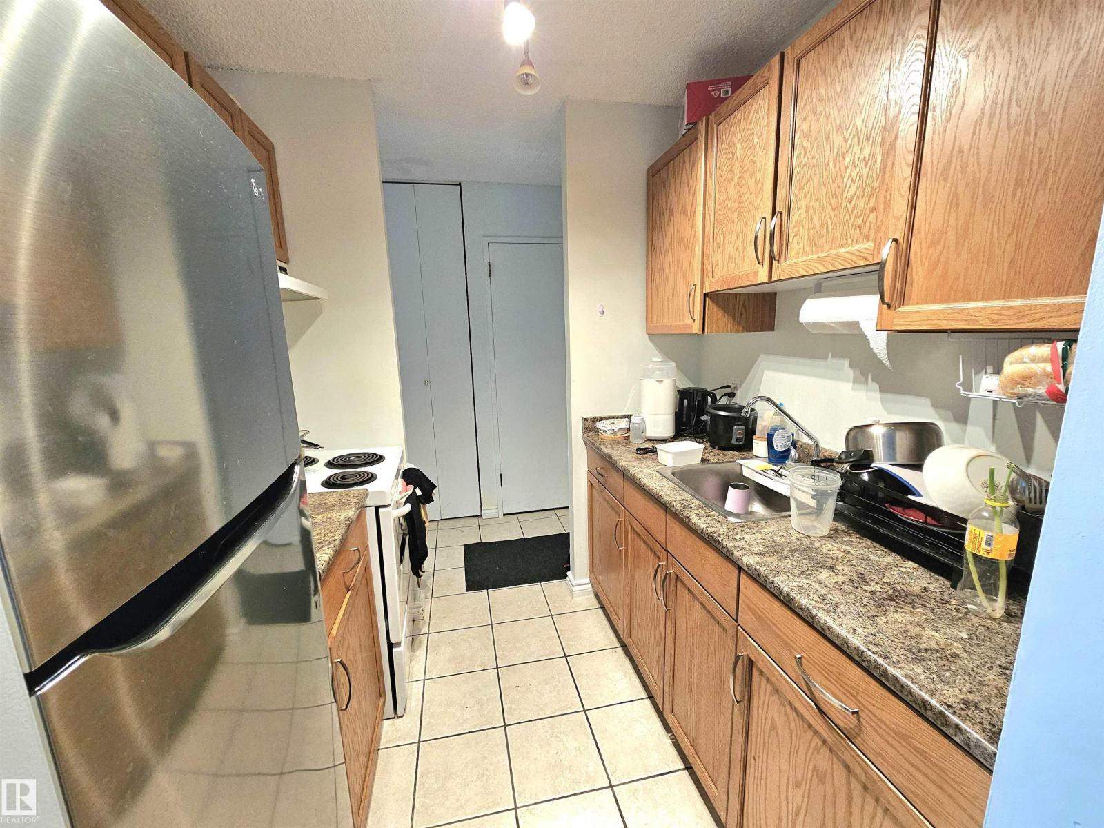 #718 13910 STONY PLAIN RD NW