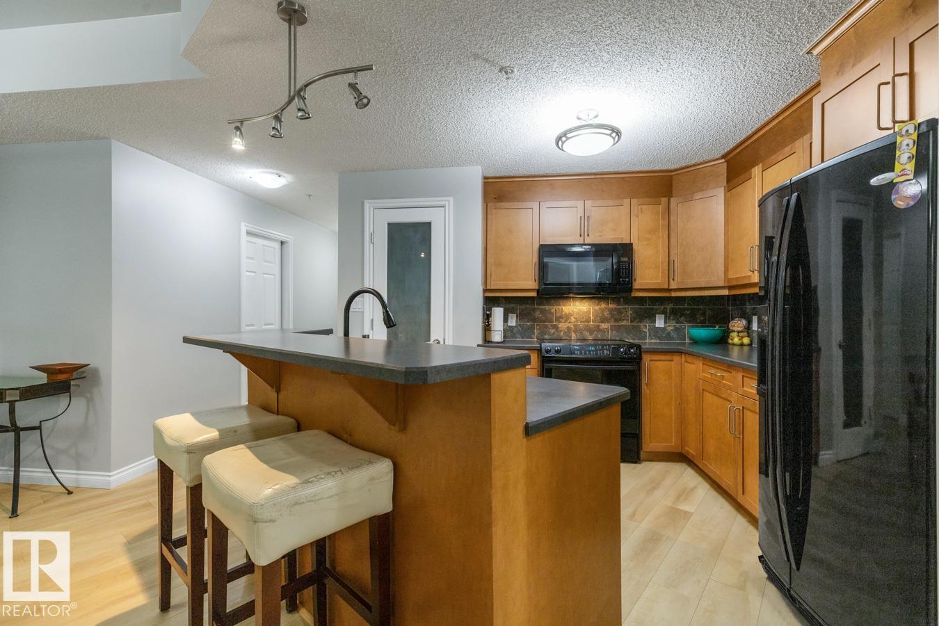 #402 9020 JASPER AV NW