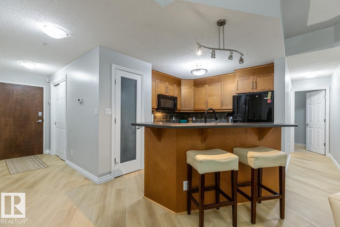 #402 9020 JASPER AV NW