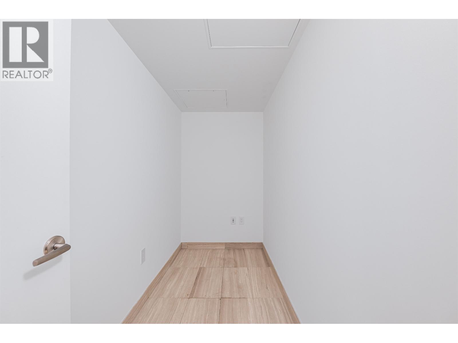 100 1561 W 57TH AVENUE