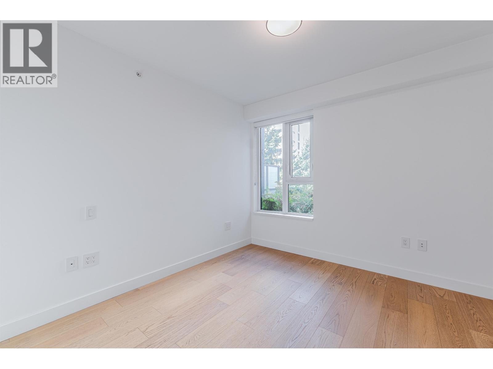 100 1561 W 57TH AVENUE