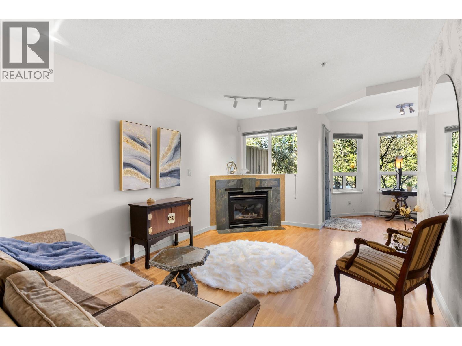 210 7383 GRIFFITHS DRIVE