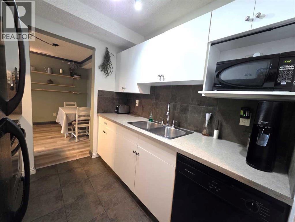 108, 647 1 Avenue NE