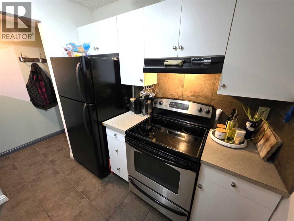 108, 647 1 Avenue NE