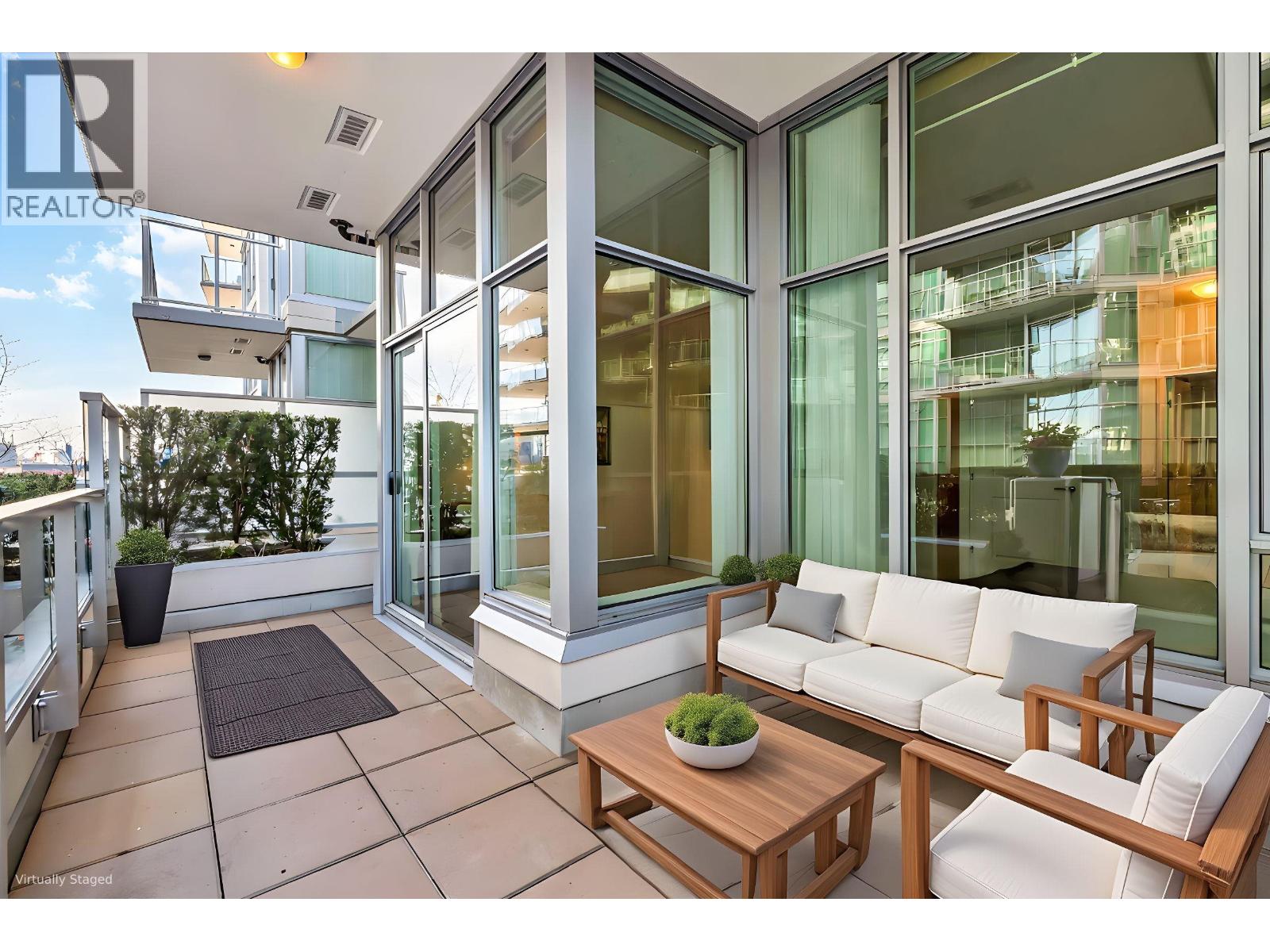 Photo 1 of 17 — 103 185 VICTORY SHIP WAY Unit 103, North Vancouver, BC V7L0G2