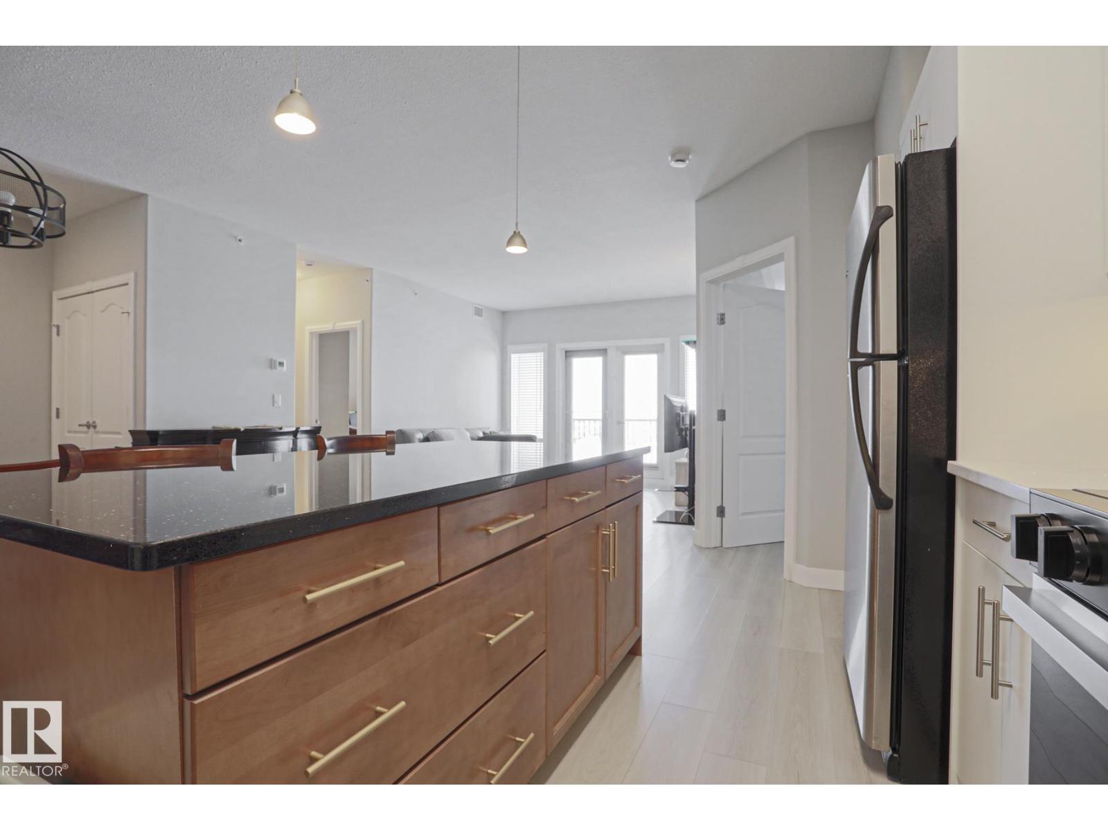 #432 1406 HODGSON WY NW