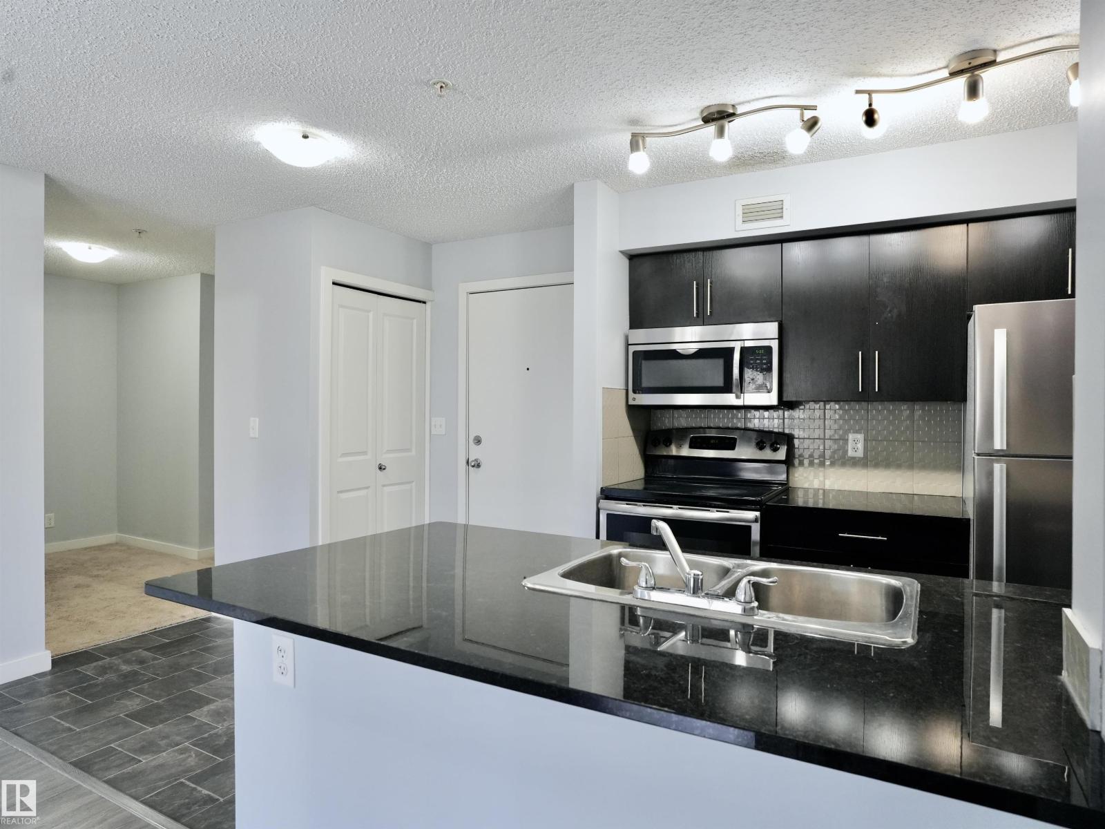 #320 5816 MULLEN PL NW
