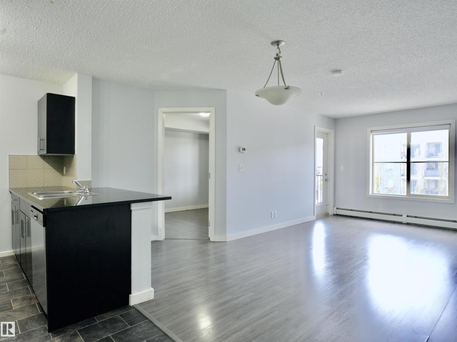 #320 5816 MULLEN PL NW