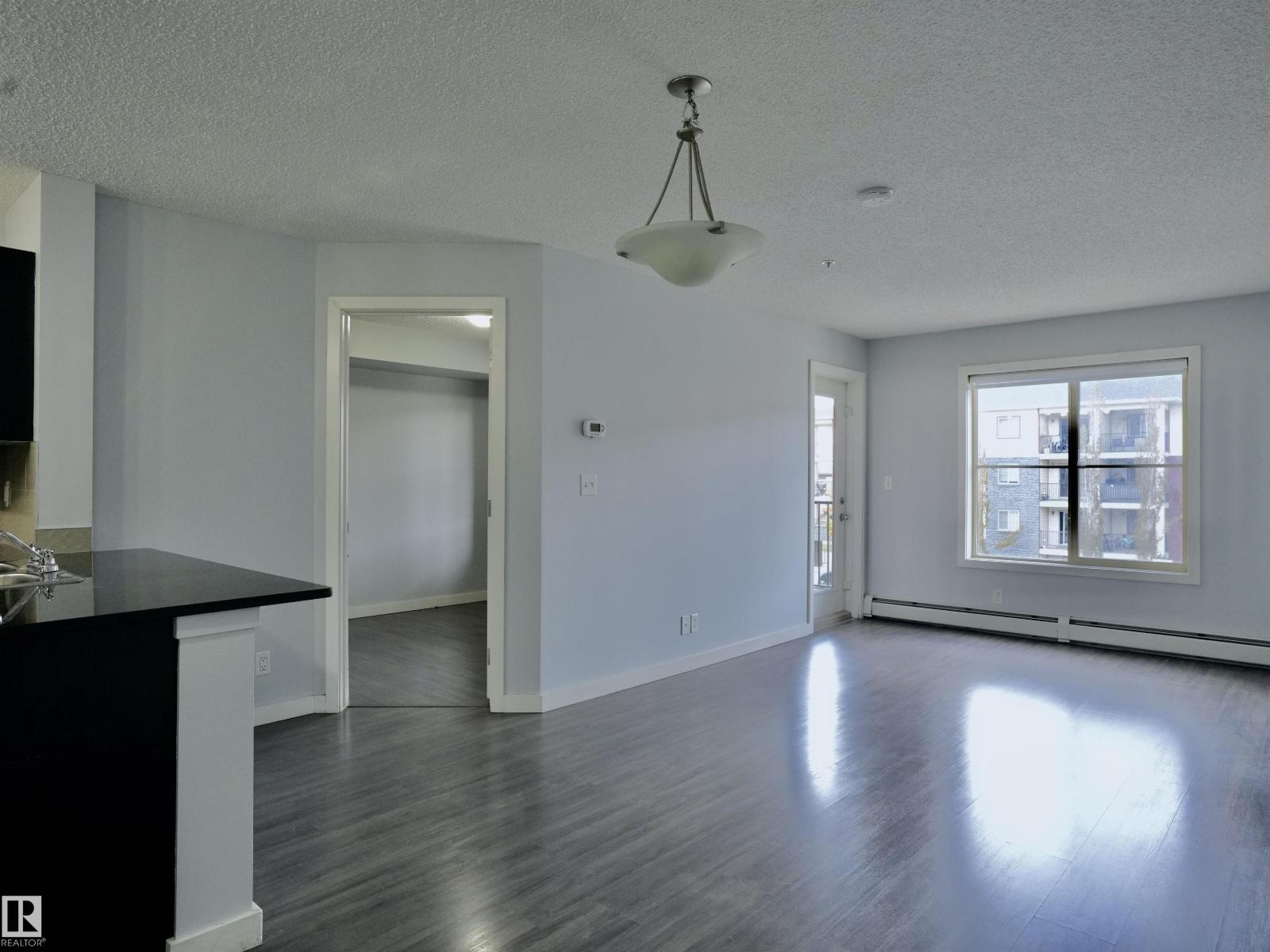 #320 5816 MULLEN PL NW