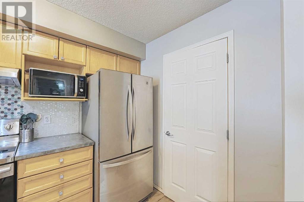 2115, 950 Arbour Lake Road NW