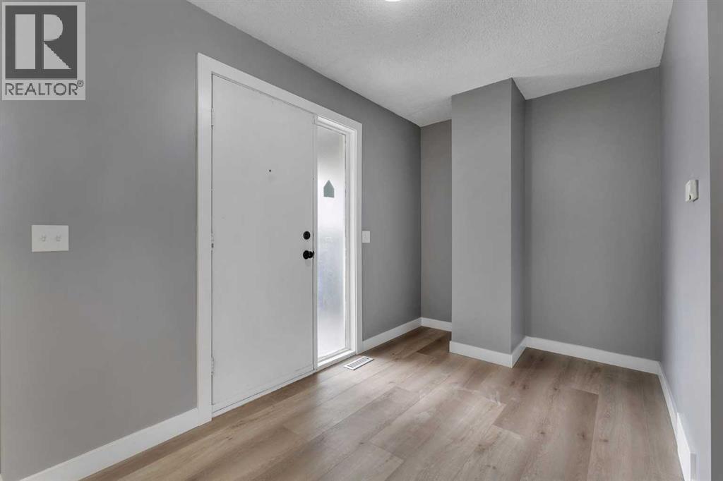 104, 7172 Coach Hill Road SW