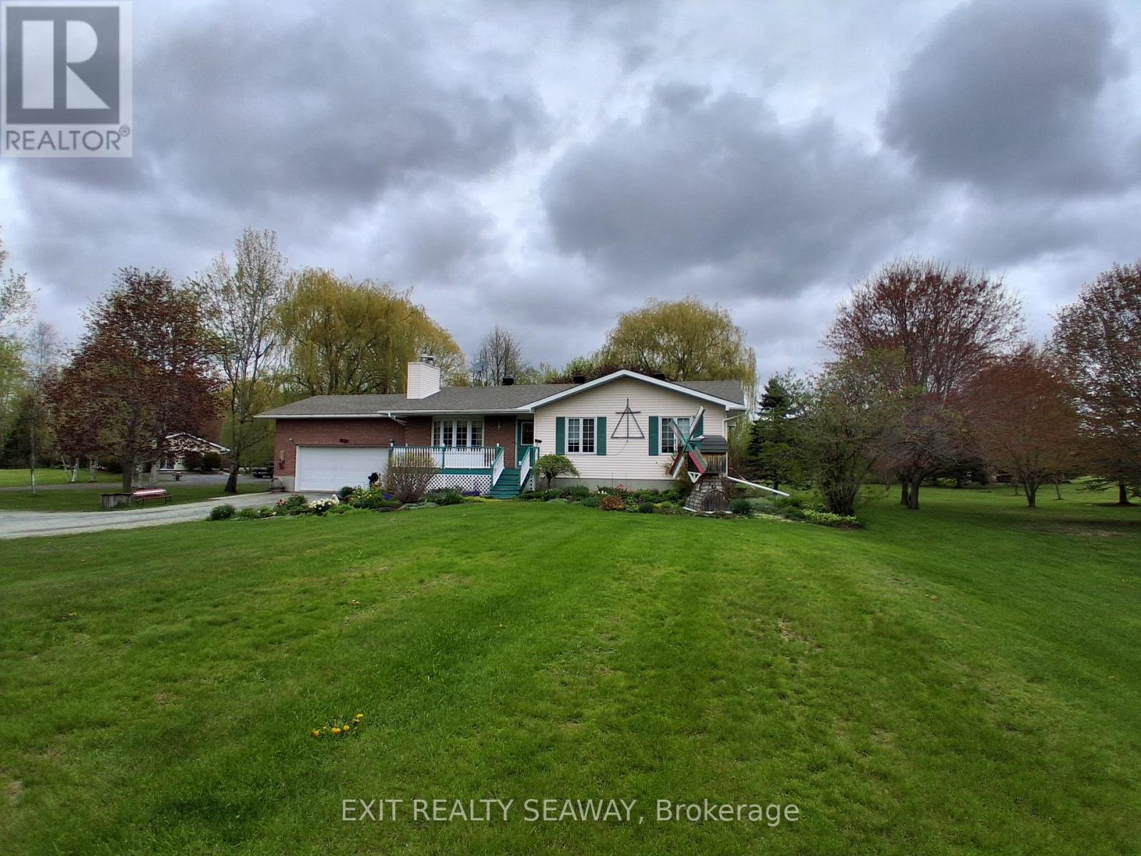 4557 CARMAN ROAD N - Photo 2