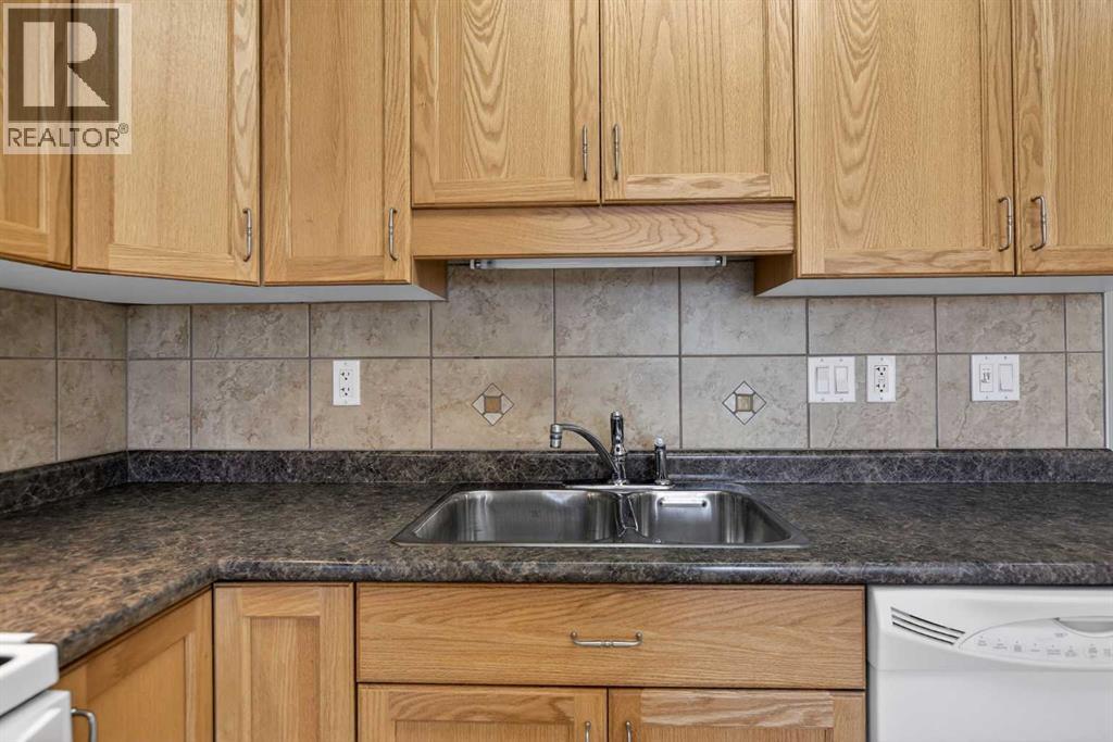 302, 400 1 Avenue SE