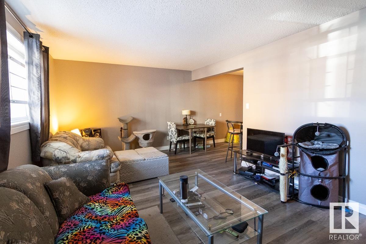 #104 10415 93 ST NW