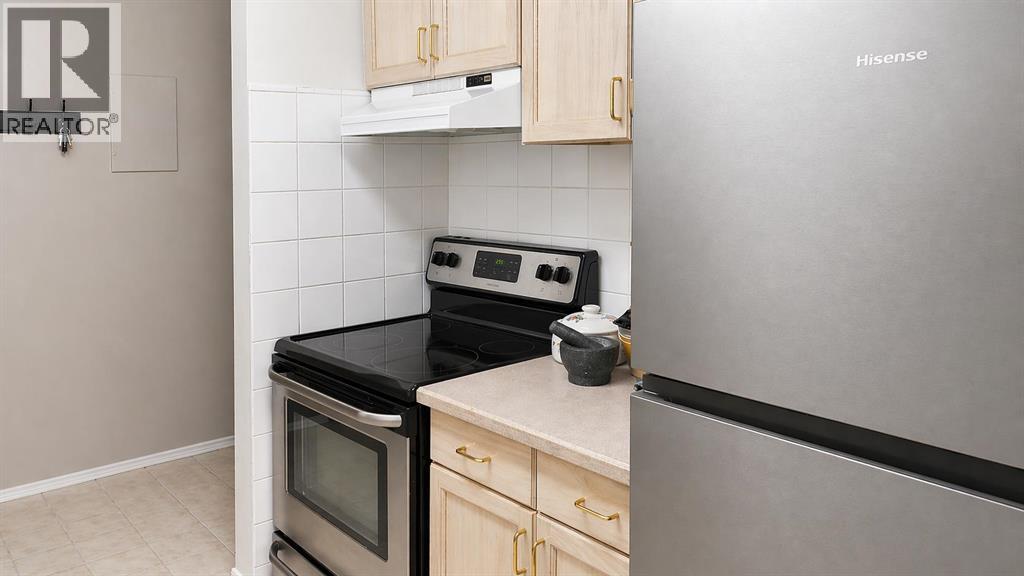 215, 723 57 Avenue SW