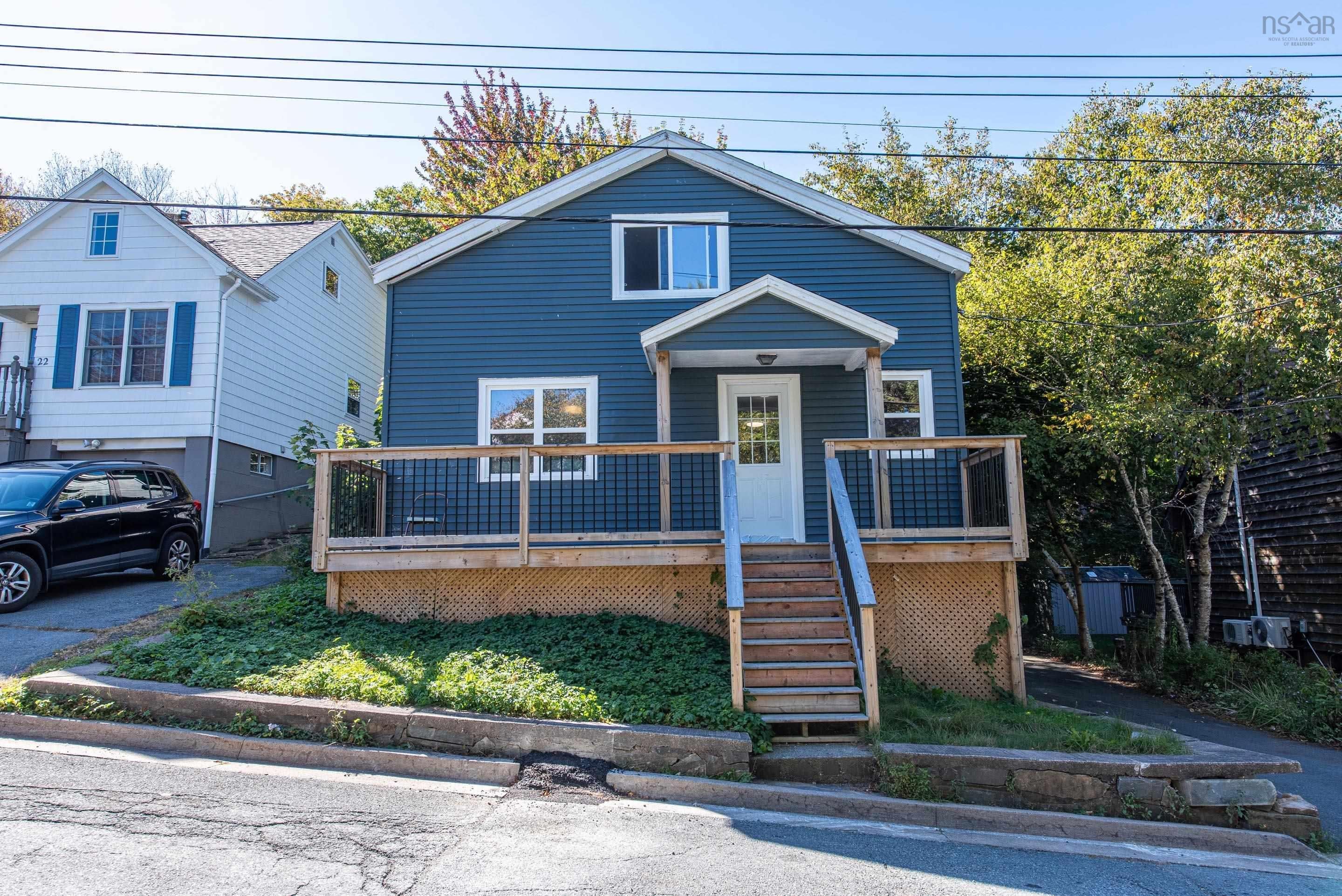 Bungalow featuring a deck