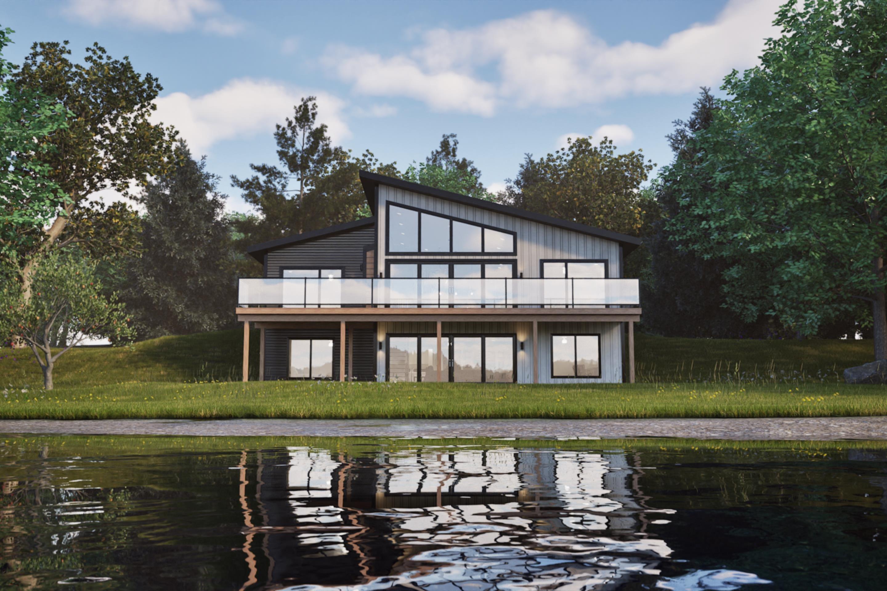 Rear view of property with a deck with water view and a lawn