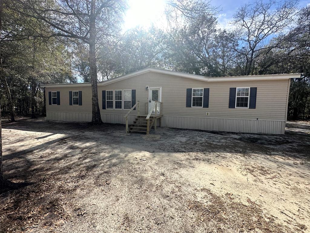 Photo 1 of 16 — 404 River Ridge Circle, Jesup, GA 31545