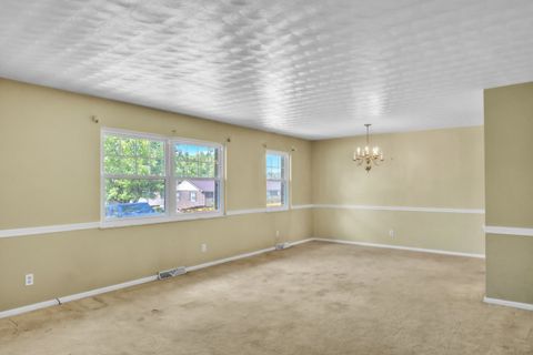 Tiny photo for 1039 Regis Street St, Russell, KY 41169 (MLS # 60488)