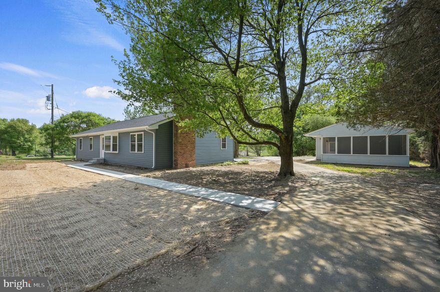 An incredible amount of care has been devoted to crafting this stunning custom home. Situated on 1.3 acres, this serene property is set well back from the road, with nothing but farmland beyond the backyard. A long asphalt driveway leads to a generous parking area behind the home and an oversized two-car detached garage with an attached screened-in porch. This home has everything you could desire.

Recent upgrades include a new roof, siding, concrete patio and sidewalk, plumbing, electrical system, water heater, high-end stainless steel appliances, soft-close oversized cabinetry with ultra-convenient drawers for pots and pans, luxury vinyl plank flooring, premium carpet, premium quartz countertops, HVAC system, windows, gutters, and septic system. The list of modern features is as thoughtful as it is extensive

The primary bathroom is breathtaking, featuring a custom tile shower and a vaulted walk-in closet worthy of a magazine feature. This is the dream home you’ve been waiting for, located in the top-rated Appoquinimink School District. Don’t miss the opportunity to make this your new home today.