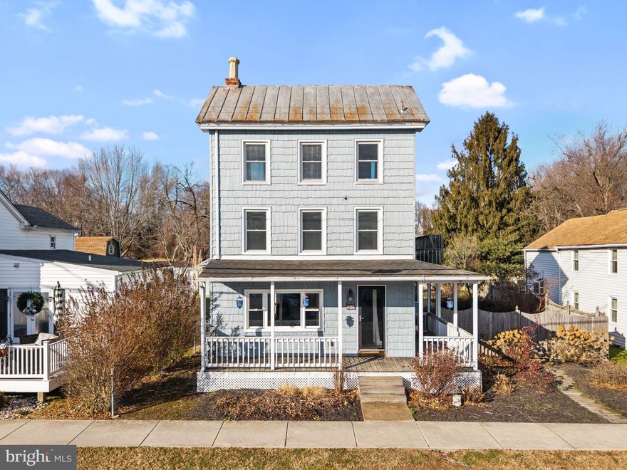 Welcome to this charming three-story historic property ideally located one row back from the C&D Canal and within walking distance to Schaefer's Canal House Restaurant in the heart of Chesapeake City.  This three bedroom home features a wraparound  porch with partial water views, large sunroom addition, hardwood floors, a main-level powder room and renovated kitchen with granite countertops.  The master suite is truly special, showcasing a vaulted ceiling with exposed beams, a private sitting room and a spacious walk-in closet.  The third level offers a sun-filled and versatile bedroom, currently used as a sewing and craft room, with spectacular views of the canal.  Additional highlights include a fenced yard, storage shed, and mature landscaping.  Enjoy easy access to biking or walking along the water on the C&D Canal Trail just across the street.  Explore Chesapeake City's quaint shops and dining options just over the bridge or the quiet park that spans behind the property.  A rare opportunity to own a piece of Chesapeake City history in a charming waterfront town.