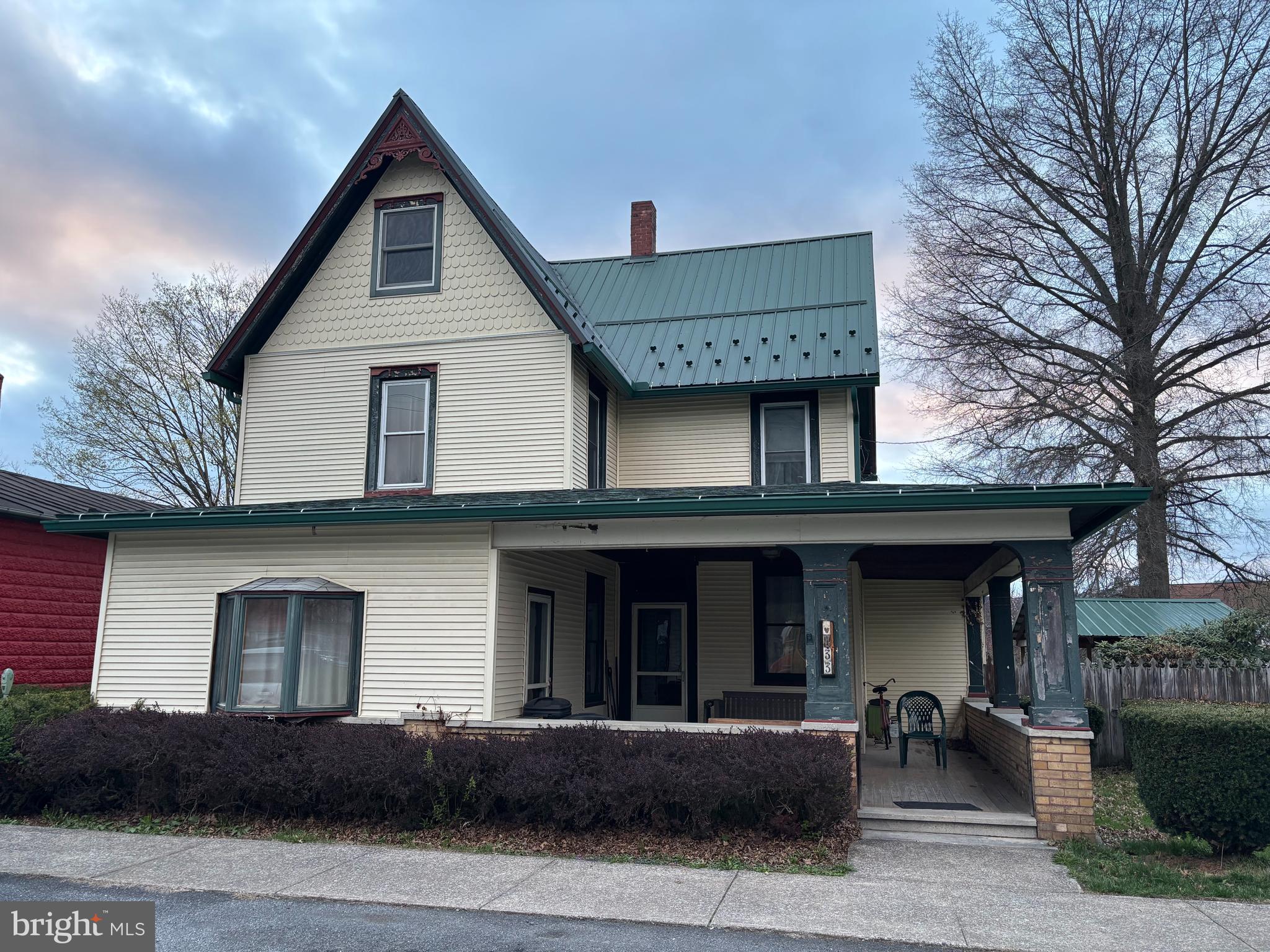 This 3-bedroom, 2-bathroom Victorian home in Howard offers a mix of original charm and practical features. It has classic woodwork, a traditional layout, and plenty of character throughout. A huge front porch welcomes you in—perfect for sitting out and enjoying the neighborhood. There's also a nice attached storage barn for extra space, whether for tools, hobbies, or general storage. Out back, you'll find a gazebo that adds a little outdoor charm and a spot to relax. If you’re looking for a home with personality and a touch of history, this could be a great fit. Home being sold AS-IS.