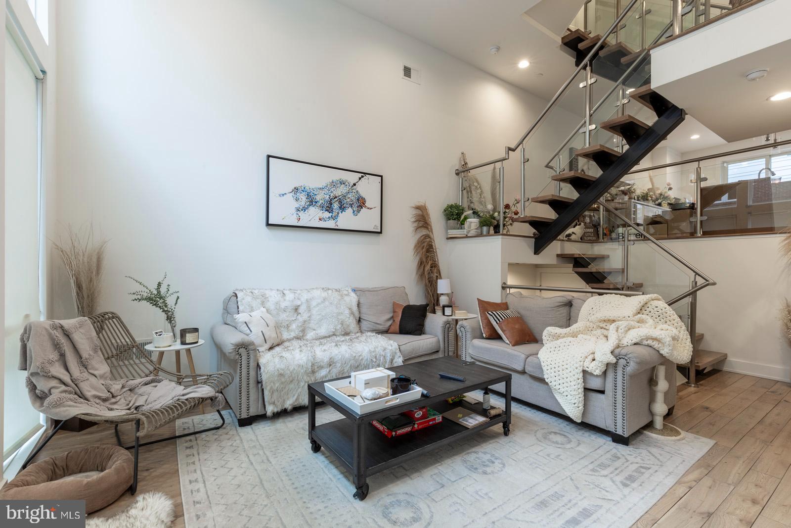 Available Early August:
Welcome to 1505 N Palethorp St, a luxurious 3-bedroom, 3.2-bathroom townhome filled with modern details, plus a private patio and roof deck! This home offers 1-car private garage parking, an in-unit washer and dryer, security cameras, a finished basement, and 2-zone cooling/heating for year-round comfort. The main level features a dramatic double-height ceiling that opens to the kitchen and creates a spacious atmosphere perfect for entertaining. A modern glass staircase is the centerpiece of the home and adds a sleek contemporary style throughout. The chef’s kitchen is equipped with an oversized island, quartz countertops, and high-end KitchenAid stainless steel appliances. Sliding glass doors lead to your 15’x10’ patio, ideal for the warmer months. Each large bedroom offers great closet space, abundant natural light, and its own full bathroom. The full-floor primary suite is a sun-drenched retreat with a massive walk-in closet and spa-like bathroom featuring a freestanding soaking tub, oversized stall shower, dual vanity, and private toilet area. Finish your tour on the private roof deck with stunning skyline views and plenty of space to entertain. Call today to claim this gem as your own!
Lease Terms:
Generally, 1st month, 12th month, and 1 month security deposit due at, or prior to, lease signing. Other terms may be required by Landlord. $55 application fee per applicant. 1 dog under 40lbs is conditional on owner's approval and may require an additional fee, if accepted. (Generally, $500/dog). Strictly no cats and a maximum allowance of 1 small dog under 40lbs. Tenants responsible for: electricity, gas, cable/internet, and water. Landlord Requirements: Applicants to make 3x the monthly rent in verifiable net income, credit history to be considered (i.e. no active collections), no evictions within the past 4 years, and must have a verifiable rental history with on-time rental payments. Exceptions to this criteria may exist under the law and will be considered.