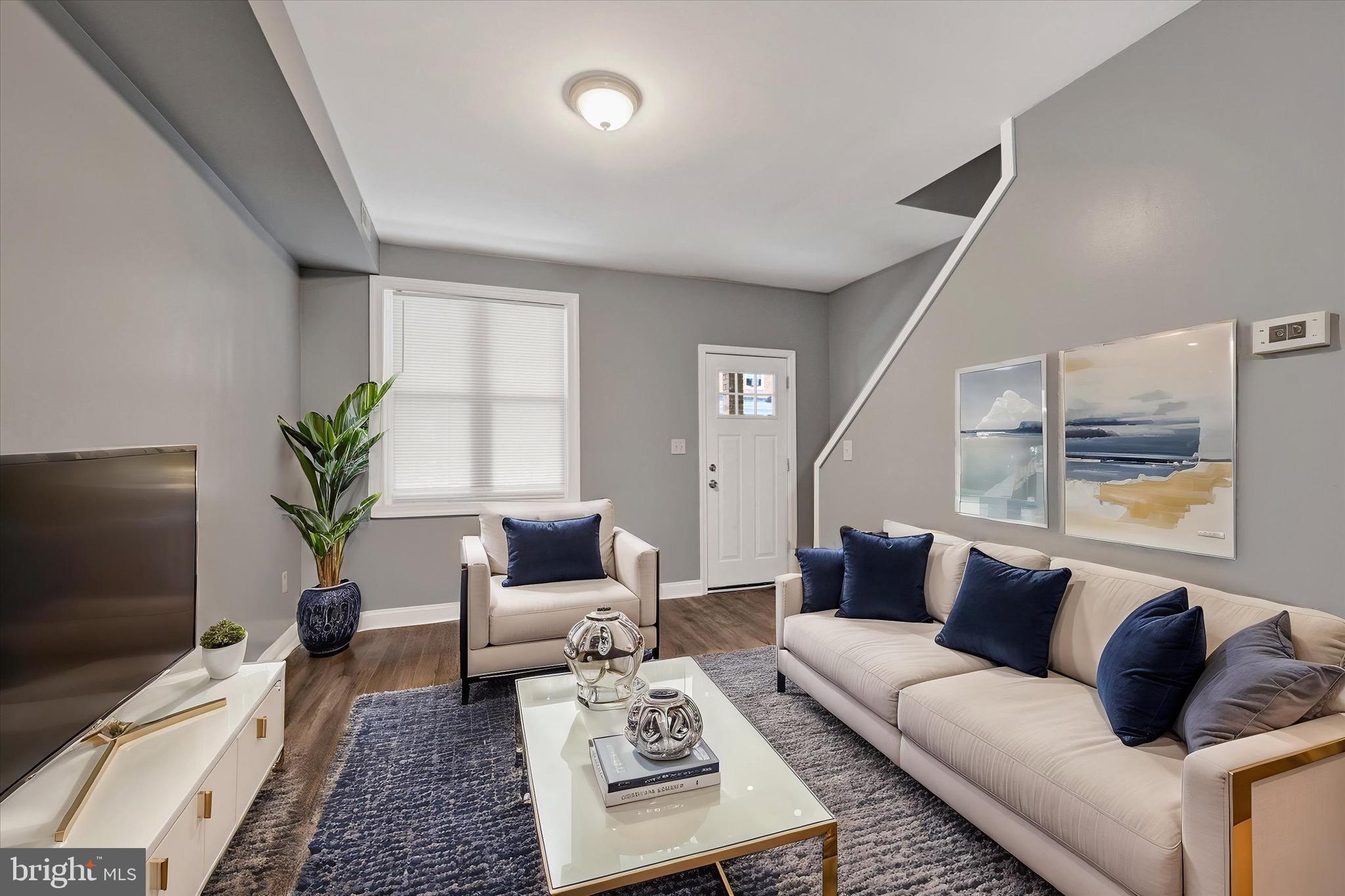 Welcome to 1221 N Curley St, a beautifully maintained 2-bedroom, 1.5-bathroom townhouse ready for its next owner! Step inside to a spacious living room that flows into the dining area and stylish kitchen, featuring stainless steel appliances, upgraded countertops, and a sleek tile backsplash. A convenient half bath completes the main level. Upstairs, you'll find two comfortable bedrooms and a full hallway bathroom. The clean, unfinished basement offers endless possibilities—create a cozy rec room, home gym, or extra storage space. Enjoy the private rear patio, perfect for relaxing or entertaining. Don’t miss this fantastic opportunity—schedule your showing today!