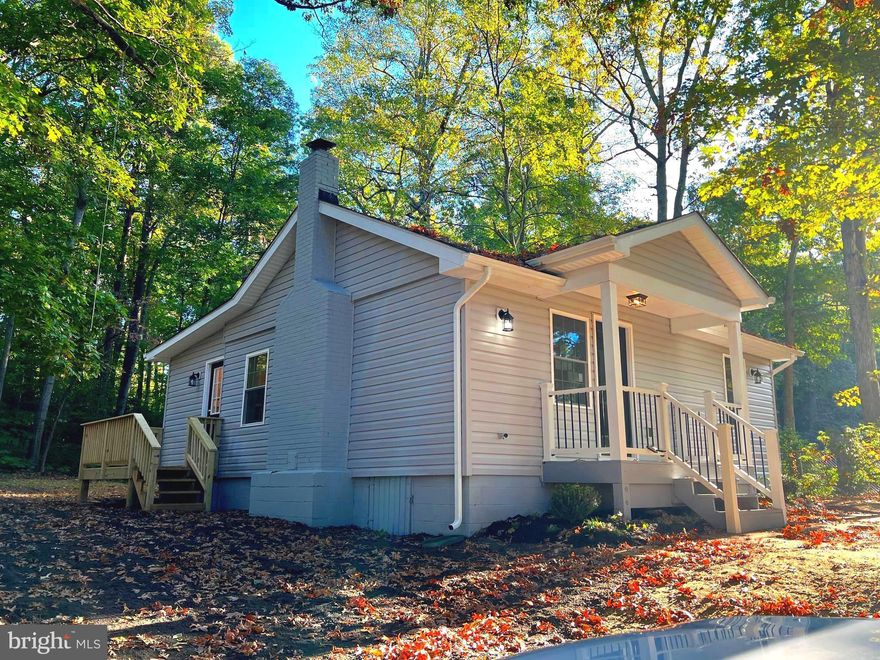 ***Do not miss this one ***  BRING YOUR OFFER*** SPECIAL FINANCING***Lovely three bedrooms/ two baths re-constructed home at the Chesapeake Ranch Estates situated on the Western Shore of the Chesapeake Bay.   The open Living Room/Dining Room & Kitchen offers high ceilings and a wood burning stove. NEW FEATURES ARE, SIDING, ROOF, FRONT PORCH, SIDE DECK, DOORS AND WINDOWS, HVAC, FLOORS AND CARPETS, NEW KITCHEN WITH STAINLESS STEEL APPLIANCES, BATHROOMS, WASHER AND DRYER. NEW SEPTIC, PLUMBING AND ELECTRIC *** Ample parking for 8-10 cars (perfect to park RV, Boat, work truck)),  large shed,  and more...  
Come to the Chesapeake Ranch Estates and the Southern Maryland lifestyle by land, sea, or air, and experience more about what else this community offers.  Baseball Field, Basketball Courts, Club House, Common Grounds, Golf Course Membership Available, Airport, Clubhouse, Trails, Picnic Area, Pier/Dock, Tot Lots/Playground, Water/Lake Privileges, Two Private Sandy Beaches on the Chesapeake Bay.   It’s a vacation spot that is also close to work... Nearby is the area’s major employment center, the Patuxent River Naval Air Station and Headquarters of the Naval Air Systems Command; plus, the hundreds of private companies that support these government facilities by providing analytical science and engineering consulting in the fields of aircraft development and flight testing.  Shopping just a mile away at the Lusby Town center. Restaurant and schools nearby and more...