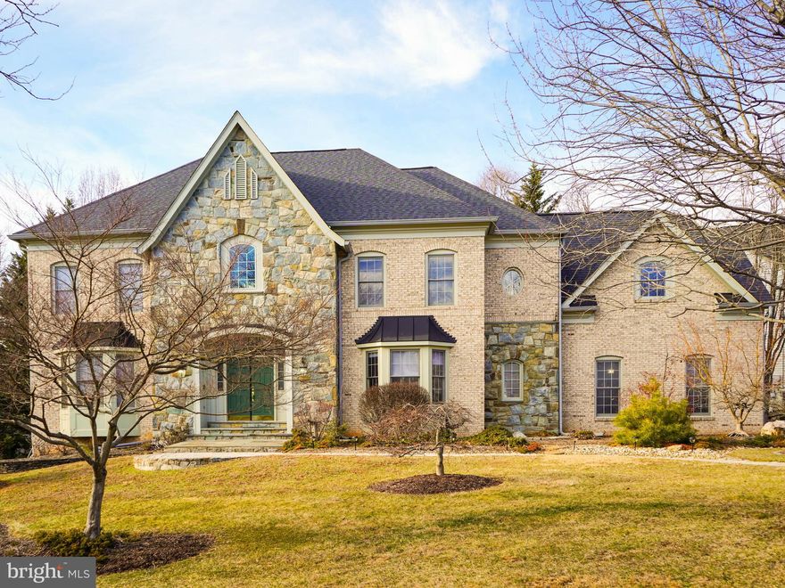 Welcome Home! This stately 5 bedroom, 4.5 Bath residence seamlessly blends timeless elegance with modern refinement.