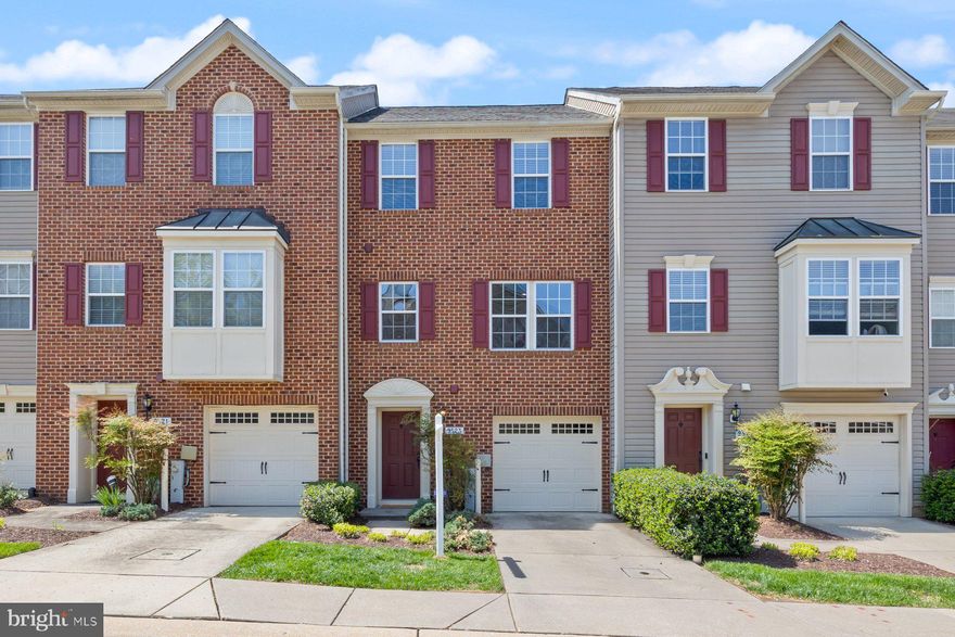 Welcome to this modern and elegant townhome in the sought-after Dorsey Crossing community in Ellicott City. With three spacious levels filled with bright light, access to a balcony and deck overlooking the pond, this home is inviting, spacious, and accommodating. The main level features a multipurpose room that can serve as a third bedroom, family room, play room, office, or guest space. Walk right through to the lower deck with views of the pond. Hang a hammock and cozy up with a book, or just enjoy some time relaxing in the soft breeze. The laundry area and powder room complete this level. On the first upper level, an open floor plan with seamless hardwood floors greet you. The gourmet kitchen has a large dining area and access to the balcony, perfect for outdoor entertaining and dining. Among the special features in the kitchen are gas cooking, large prep space to include the island, pantry, granite countertops, stainless steel appliances, and recessed lighting. The open concept layout connects the kitchen to the living room, allowing you and your guests to easily mingle. On the second upper level there are two oversized bedrooms. The primary bedroom with vaulted ceiling, with en-suite bathroom and spacious walk-in closet, is a relaxing retreat to unwind at the end of the day. A second large bedroom has access to the connected hallway bathroom. Both bathrooms have soaking tubs and shower, ceramic tile surround, and ceramic tile floor. The one-car garage with concrete parking pad is a great feature.  Located just minutes away from Centennial Park and Fairway Hills Golf Club, this home offers great recreational and leisure opportunities. The meticulous care and pride of ownership shine throughout making this home stand out. A 1-year home warranty is offered for peace of mind. Come and enjoy a tour today!
