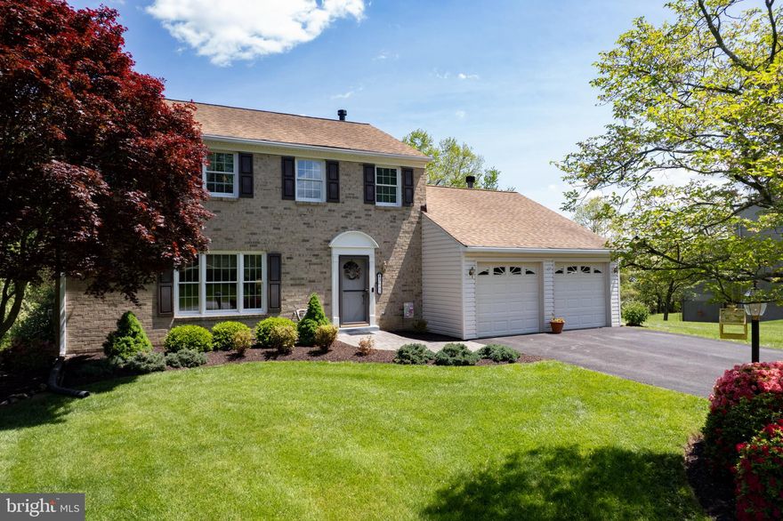 Stunning brick front colonial located on a premium lot in Font Hill!  This four bedroom, two and one half bath home is perfectly maintained by the original owner.  A well landscaped front yard and paver lead walk sets the tone for this special home.   The living room features rich hardwood flooring, built-ins and a gas fireplace.  The dining room with crown molding and hardwood floors is the perfect place to entertain.  The heart of the home is the kitchen with 42" hickory cabinets, quartz countertops and a sunny breakfast nook.  The family room off the kitchen with a wood burning fireplace leads to a spacious screened porch and low maintenance deck overlooking one of the best lots in the neighborhood. Convenient main level laundry and a private half bath complete the main level. Upstairs you will find four bedrooms and two full baths.  The primary bedroom features a walk-in closet, ceiling fan, and a private bath with custom shower. The walk-out lower level with a rough-in for a bathroom has endless possibilities for expansion.  The two car garage features an epoxy floor and built-in storage and the shed in the back yard is great for additional storage. Recent mechanical updates include A/C in 2023, natural gas water heater in 2015 and replacement Andersen windows. Convenient to top ranked schools, shopping, dining and recreation.