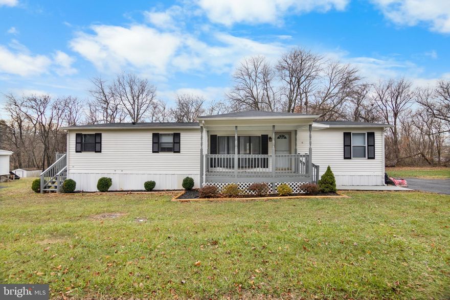 Welcome to 92 Paul's Place, a charming home conveniently located just off I-81. Situated on a spacious, private (leased) lot, this property offers seclusion in both the front and rear yards. The exterior features a two-car driveway, a covered front porch, side deck access, and a large back deck that's perfect for entertaining while enjoying views of the expansive yard and mature trees. At the back of the property, you'll find a large storage shed for added convenience. Inside, you'll be greeted by a fully renovated home. The front entry opens into a bright, open-concept living and dining area, featuring updated flooring, fresh paint, and updated trim. Large windows flood the space with natural light, creating a welcoming atmosphere. To the left, the upgraded kitchen shines with modern cabinetry, sleek countertops, and stainless steel appliances. The kitchen connects to a multi-purpose room and a separate laundry area, complete with a washer and dryer. The spacious master bedroom boasts high ceilings and an updated bathroom with luxurious marble flooring, a glass-enclosed shower, and a deep soaking tub. Two additional bedrooms are located across the hall, sharing a beautifully remodeled full bathroom. Completely renovated from top to bottom, this home offers a modern living experience with plenty of space to enjoy. Don't miss out-schedule your showing today!