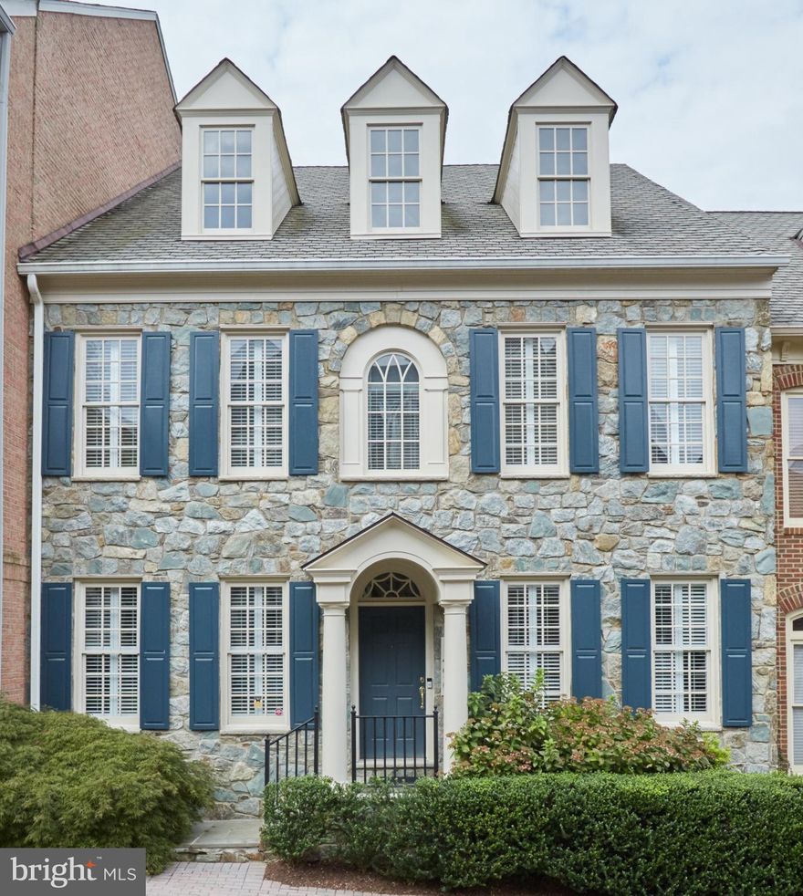 MAGNIFICENT ELEVATOR TOWNHOME!  A stone center hall colonial sure to win your heart, 1496 Teague Drive offers soaring ceilings and distinctive moldings in generously-proportioned rooms.  Paneled ELEVATOR and wood floors throughout.  Subtle adaptations have made the home nicely accessible for anyone with mobility issues.  Evans Farm, a gated community in McLean, offers convenience and gracious living, all in a beautifully landscaped setting.