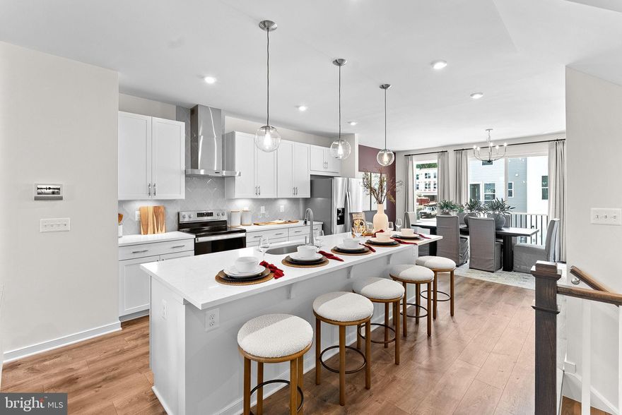 *NEW CONSTRUCTION* Special All-In Price, February Move-In! Step into the Potomac, a superior 3-level townhome with a 2-car garage in the sought-after Cascade Landing community in Dumfries, VA. This thoughtfully designed home offers 3 bedrooms, 3.5 baths, and a finished recreation room, all with 9 ft. ceilings for an open, airy feel. The gourmet kitchen is a showpiece, featuring upgraded white cabinets, quartz countertops, ceramic tile backsplash, range hood, and stainless-steel Whirlpool appliances. Designer laminate flooring flows throughout the main level, including the kitchen, walk-in pantry, dining room and great room. The luxurious primary suite includes a generous walk-in closet and a spa-inspired bathroom with raised double vanities, quartz countertops, and a shower with designer ceramic tile. Plus, the garage includes an EV charger-compatible outlet, making this home future-ready. Limited-Time Incentives: Get $20K in Closing Costs until 1/31. Hometown heroes get $2,500. See New Home Counselor for details. Enjoy low-maintenance living with affordable HOA dues (no hidden developer fees) so you can put your savings toward what matters most. Cascade Landing offers a welcoming neighborhood with a playground, easy walkability, and quick access to premier parks and trails. These advanced performance homes save you money on utilities while reducing your carbon footprint. Located just 2 minutes from Marine Corps Base Quantico (North Gate) and with direct access to I-95, commuting is effortless. Plus, you’re close to Fortuna Center Plaza, Locust Shade Park, and dining favorites and entertainment. Model Home Hours: Mon–Sun, 11 AM–6 PM. Use 17910 Alicia Avenue, Dumfries, VA 22026 for GPS directions