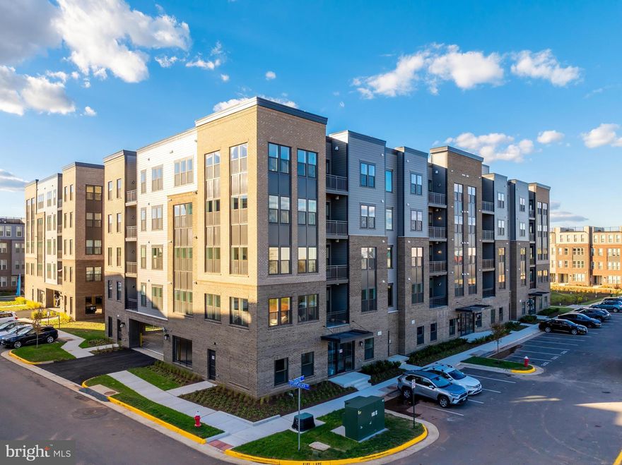 IMMEDIATELY AVAILABLE!
Brand-new 2-bedroom, 2-bath elevator condo with home office and garage parking near Ashburn Station Metro. Features include 9-foot ceilings, beautiful LVP flooring, upscale finishes, and a private balcony.   Enjoy a vibrant community with amenities such as a fire pit, pickleball and bocce courts, dog park, pavilion, grills, and picnic areas — all in a prime Ashburn location! Water and sewer are included in the rent.