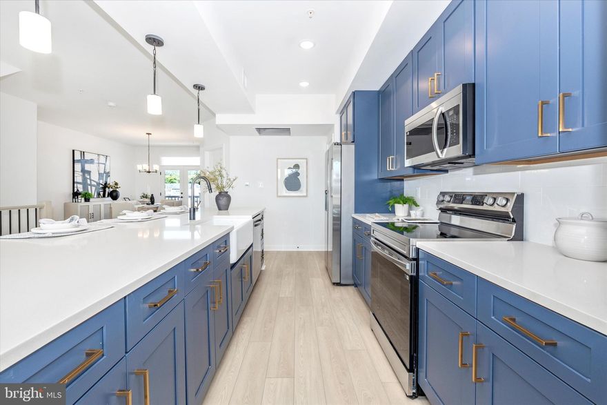 Brand new and never lived in, this luxury condo is now available for lease! Featuring the highly coveted Topanga design package with blue cabinets, upgraded appliances, and stylish finishes throughout, this two-level home offers 3 oversized bedrooms large enough for king-size beds, 2.5 baths, and plenty of living space. The main level includes a wide-open layout with a 12-foot kitchen island, family room, dining area, office nook, powder room, and two terraces with mountain views. The primary suite is also on this level with a walk-in closet, spa-inspired bath, and bright windows (with new window coverings already installed). Upstairs are two additional spacious bedrooms, a full bath with dual sinks, and a laundry area with a brand-new washer and dryer that has never been used. This home also includes two off-street parking spaces, one in the attached garage and one in the driveway, along with window coverings already installed. Perfectly located just minutes from I-70, I-270, Rt. 15, downtown Frederick, shopping, dining, and hiking trails, this is a rare opportunity to lease a pristine, brand new home with modern style and incredible space.